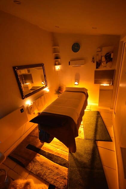 Candlelit massage room at the Pesti Massage studio in Budapest